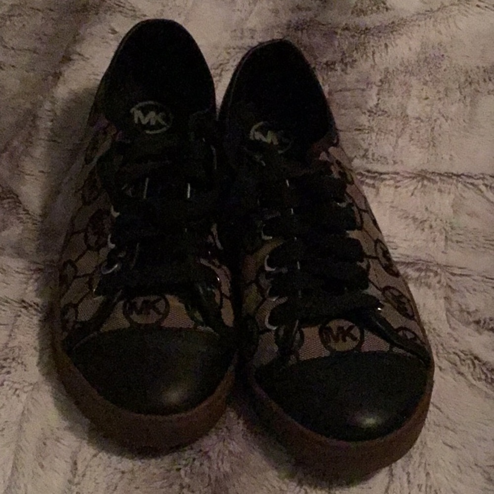 Pair of Micheal Kors tennis shoes